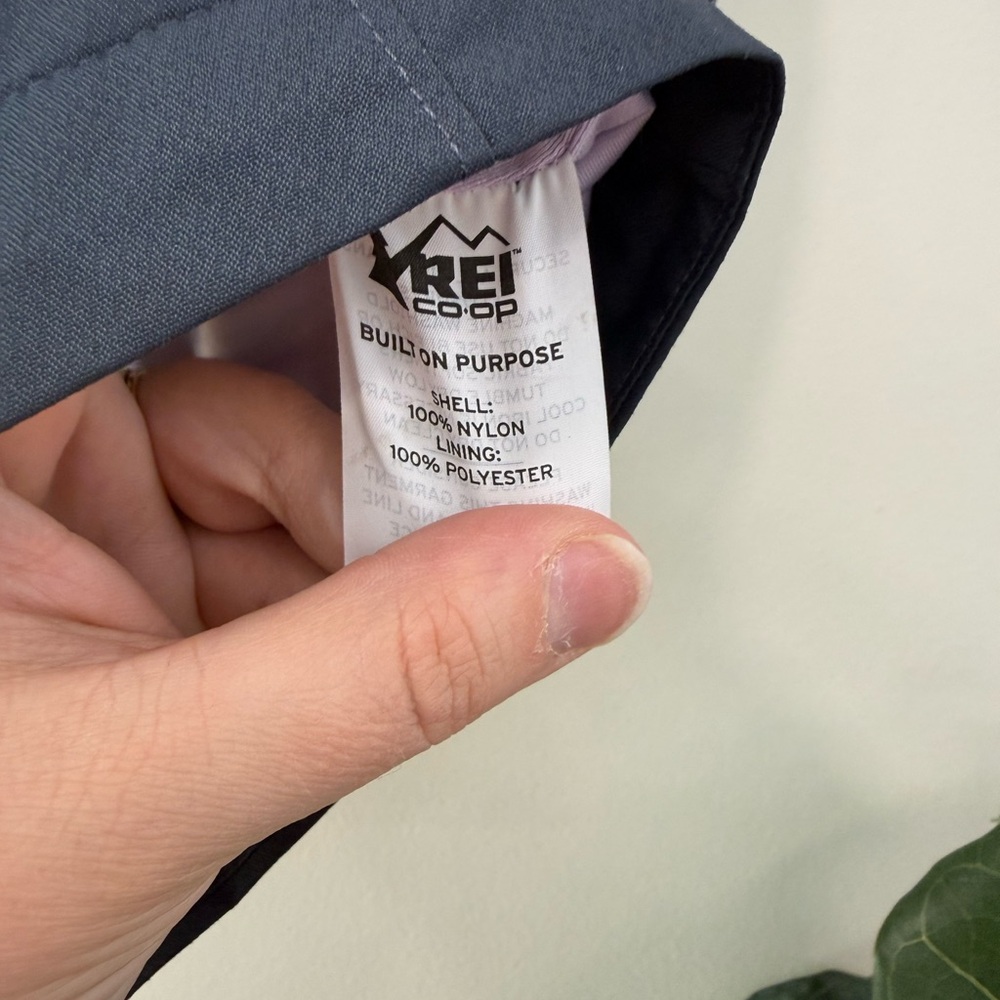REI Kids Navy Raincoat with Light Purple Zipper - Picture 3 of 4